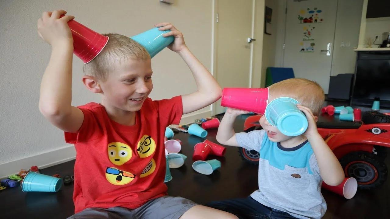 Mike and Jake Stacking Cups, Building Pyramids and Demolish them